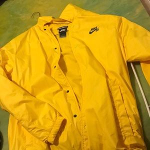 Yellow men and women’s Nike light weight jacket